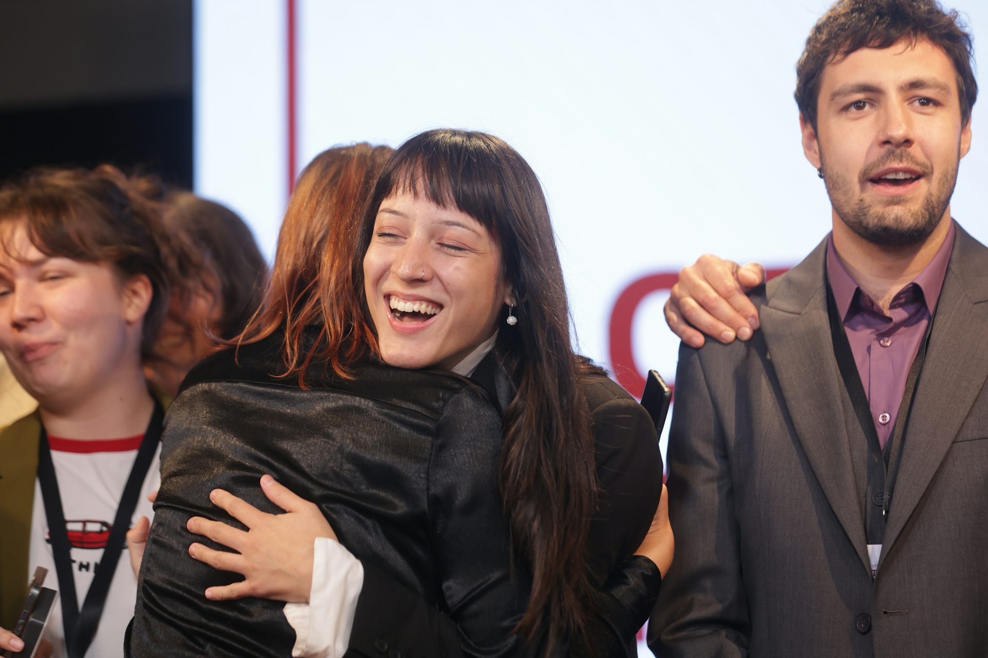 People celebrate at the Student List headquarters in Belgrade.