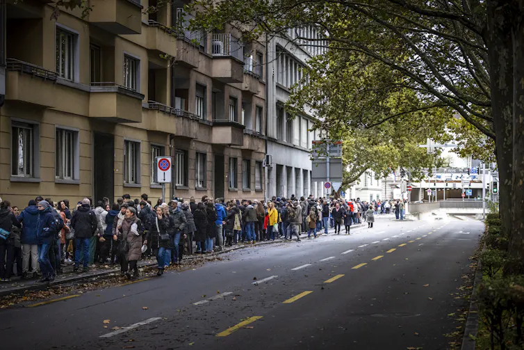 A queue of Serbian citizens outside the Serbian embassy in Zurich.