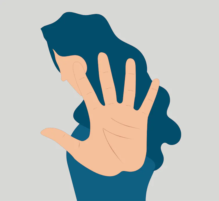 A graphic image shows a silhouette of a person turning away, with their hand covering part of their body.