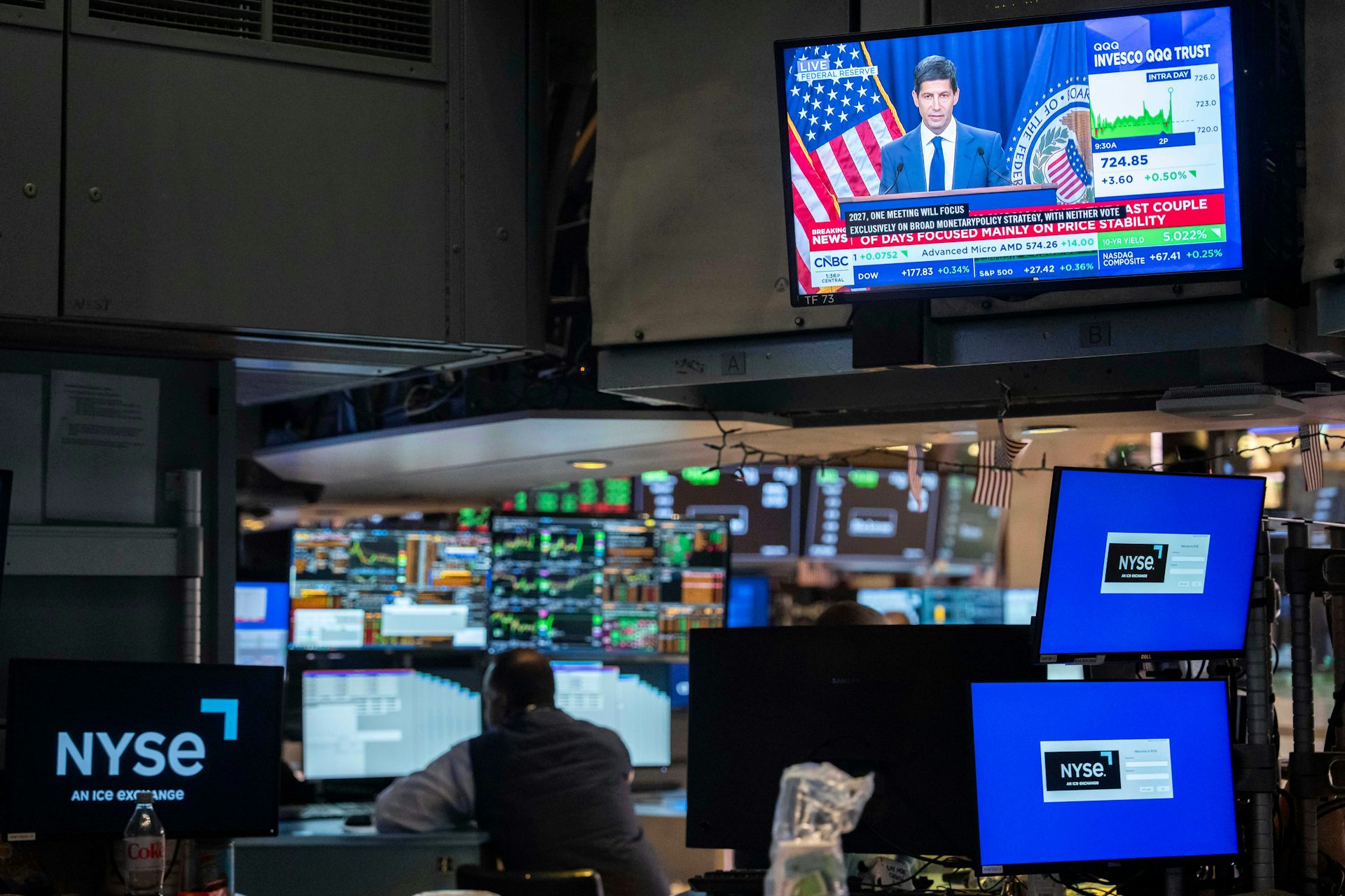 A screen over the floor of the New York Stock Exchange displays a news conference by Federal Reserve Board Chairman Kevin Warsh, Oct. 28, 2026.