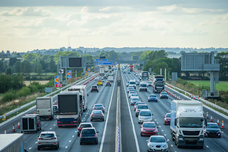 busy uk motorway with heavy traffic in both directions