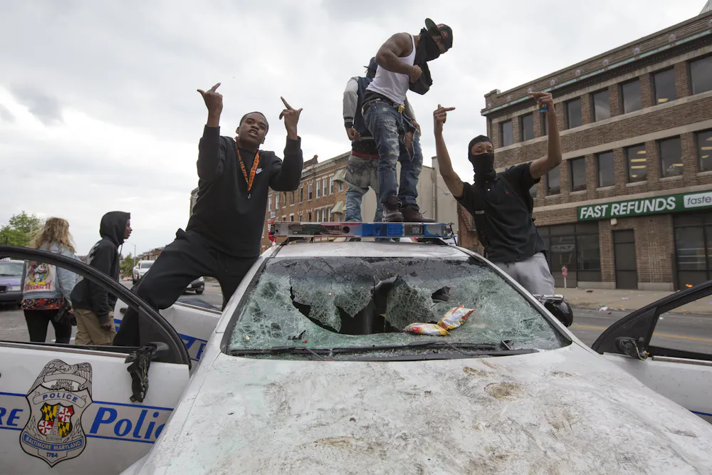 What led to the Baltimore riots?