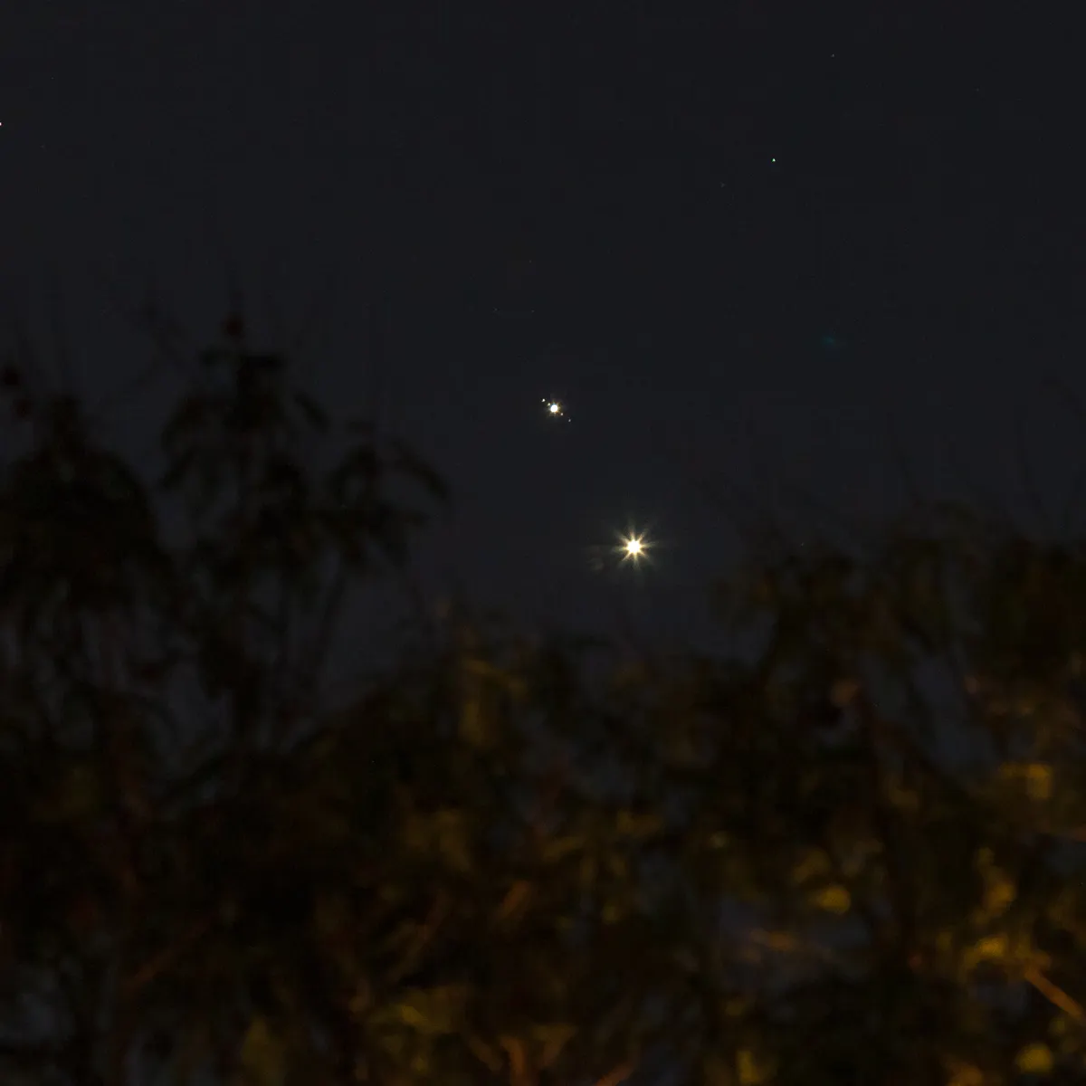 Jupiter And Venus Brush Cheeks In The Night Sky