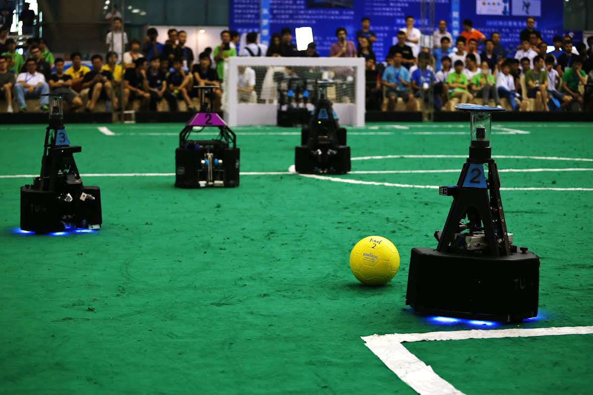 Footballing androids of RoboCup are vital players in our robotic future